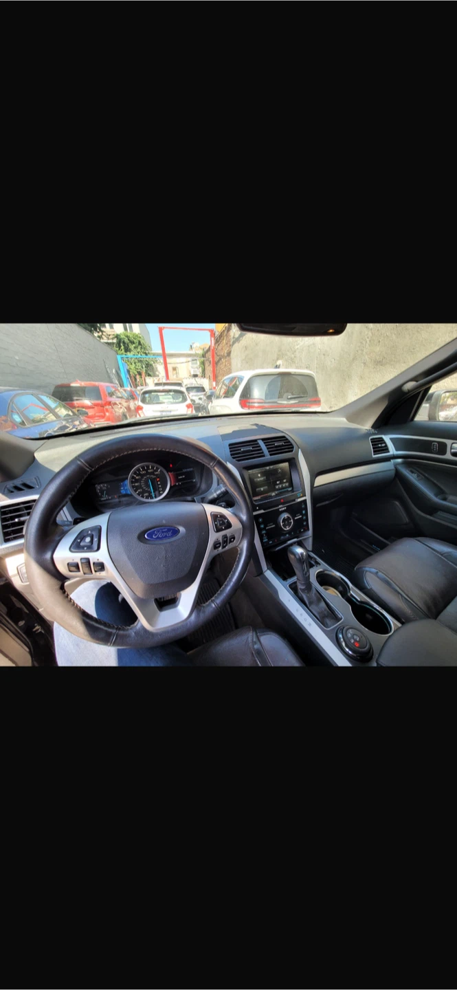 Black Ford Explorer SUV - photo 3