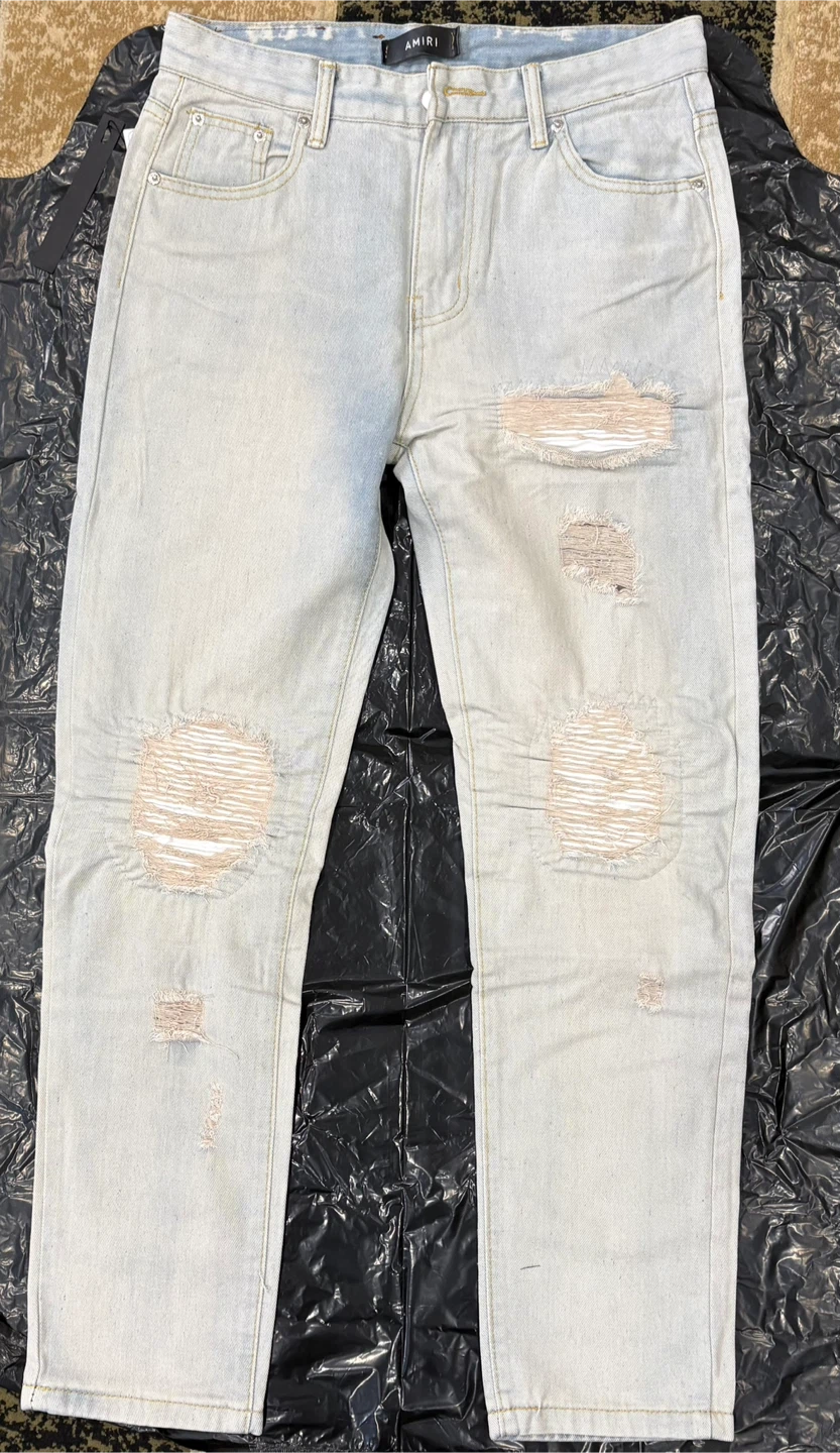 AMIRI Distressed Light Wash Denim Jeans - Size 32