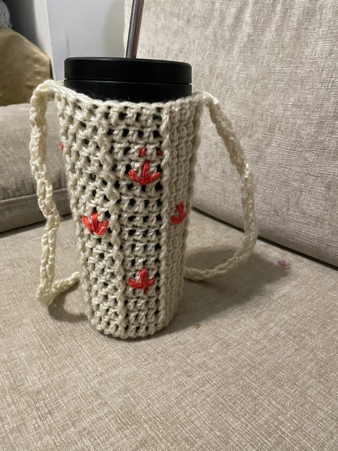 Hand-Crocheted Cream Bottle Holder with Red Leaf Accents