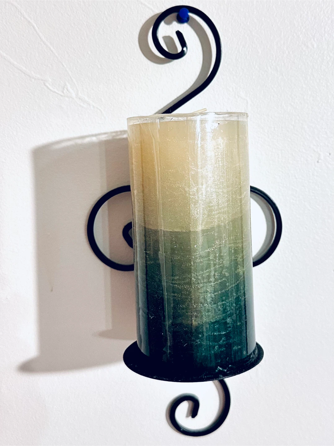 One Set of Candle Wall Sconces and Candles.