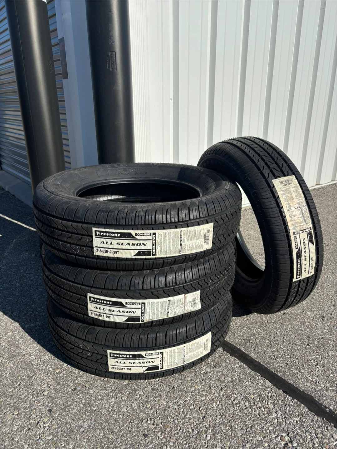 Firestone 215/65R17 all season tires - set of 4 brand new