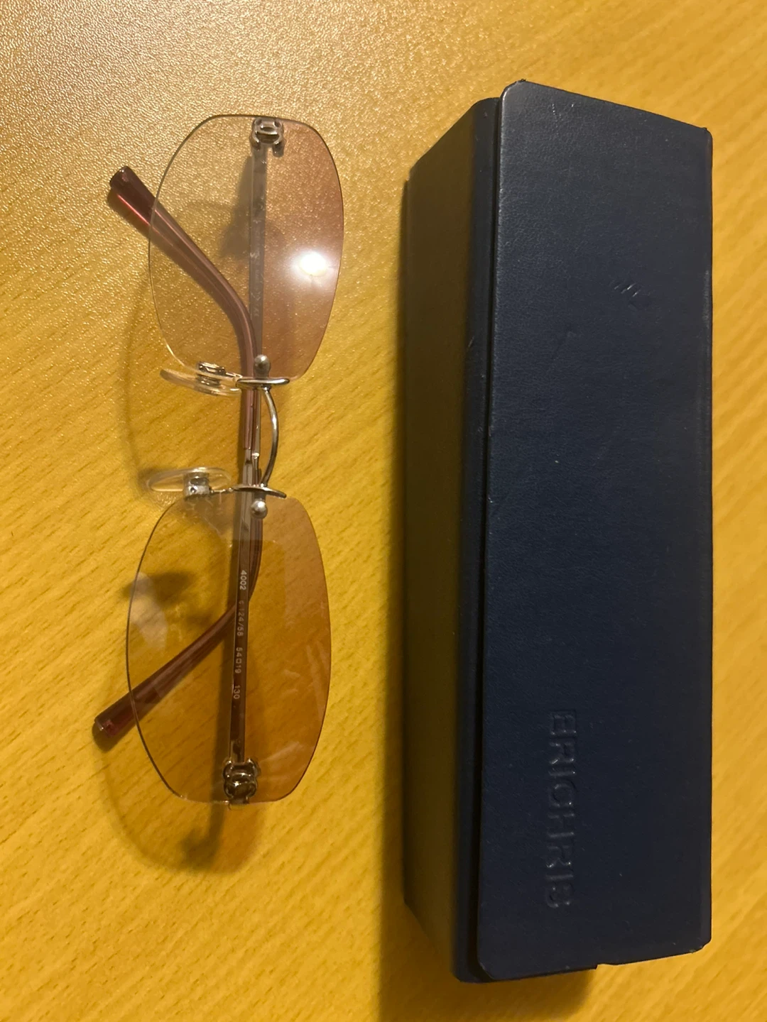 Rimless Oval Sunglasses with Case