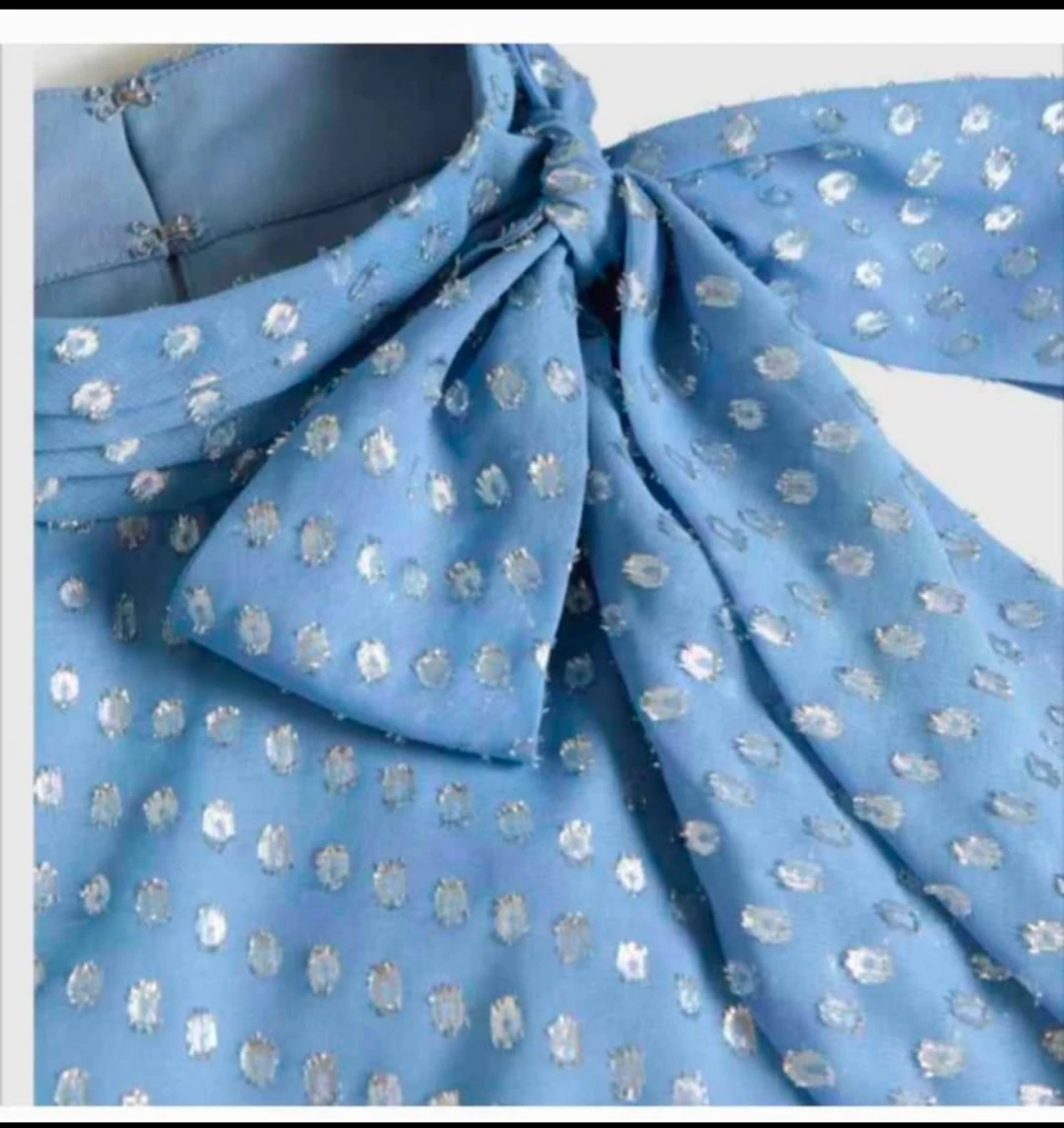Blue tiered dress with silver polka dots and bow detail - photo 2