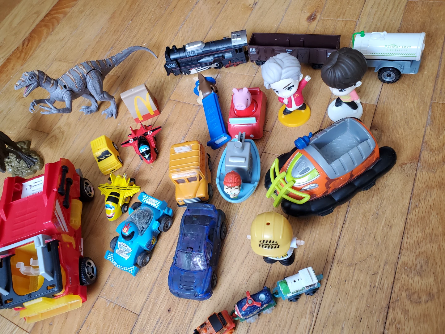 Assorted Toy Vehicles, Figures, and Dinosaurs