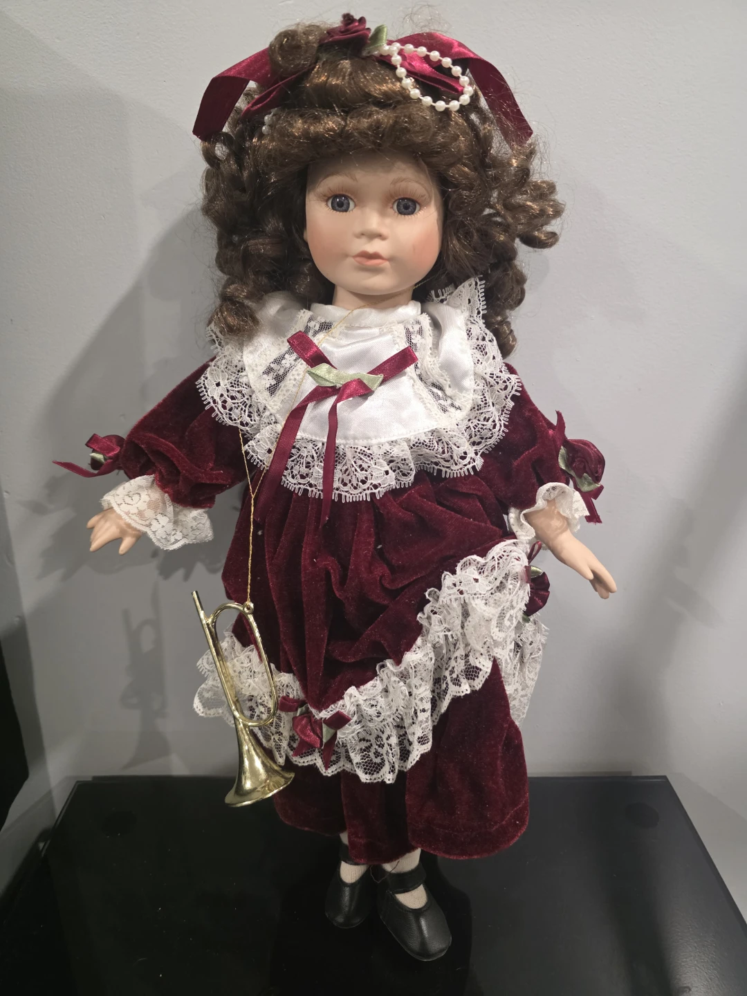 Porcelain Doll with Burgundy Velvet Dress