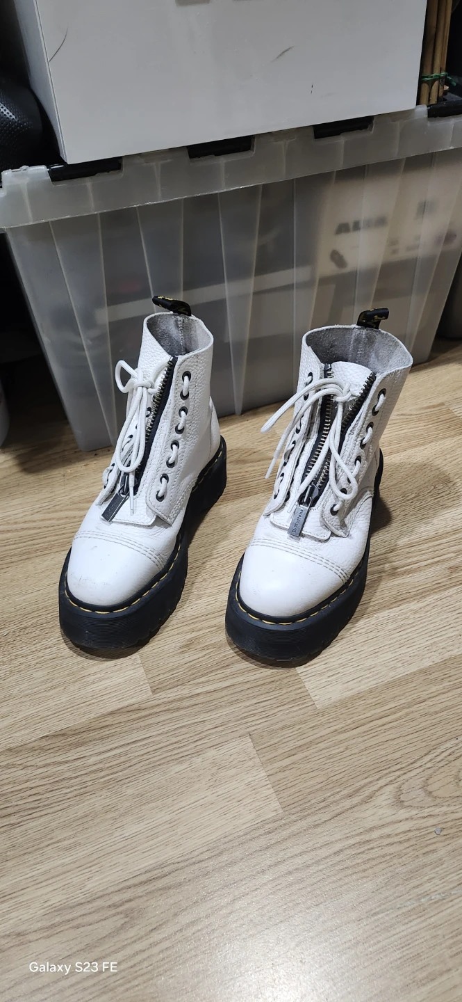 Dr. Martens White Leather Boots. please is firm