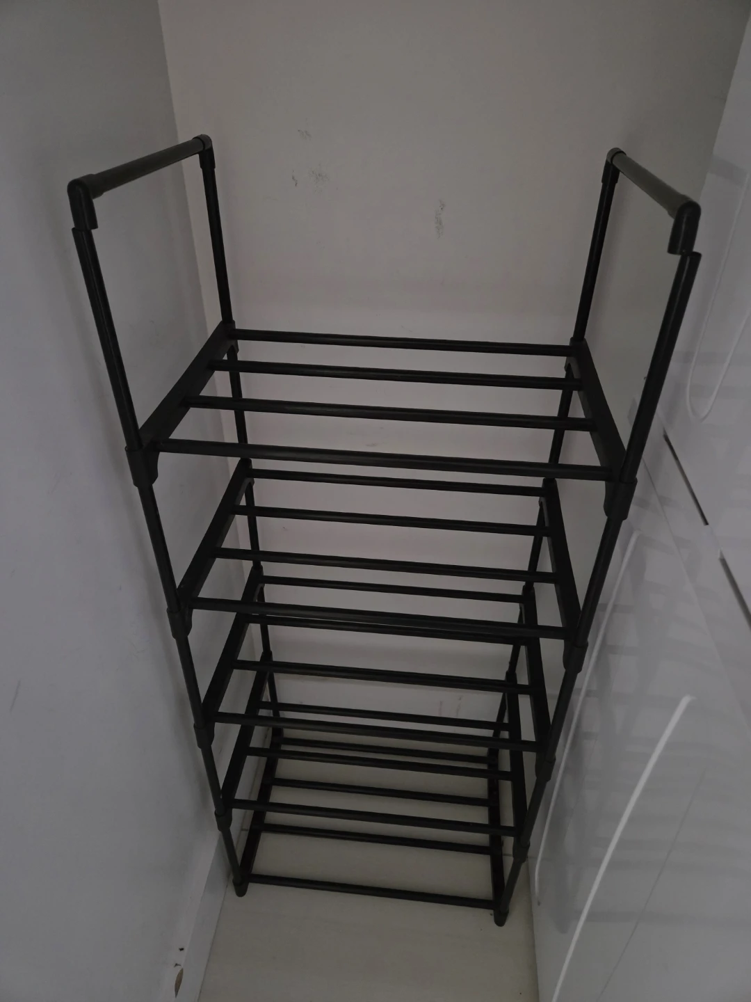 Black plastic Shoe Rack