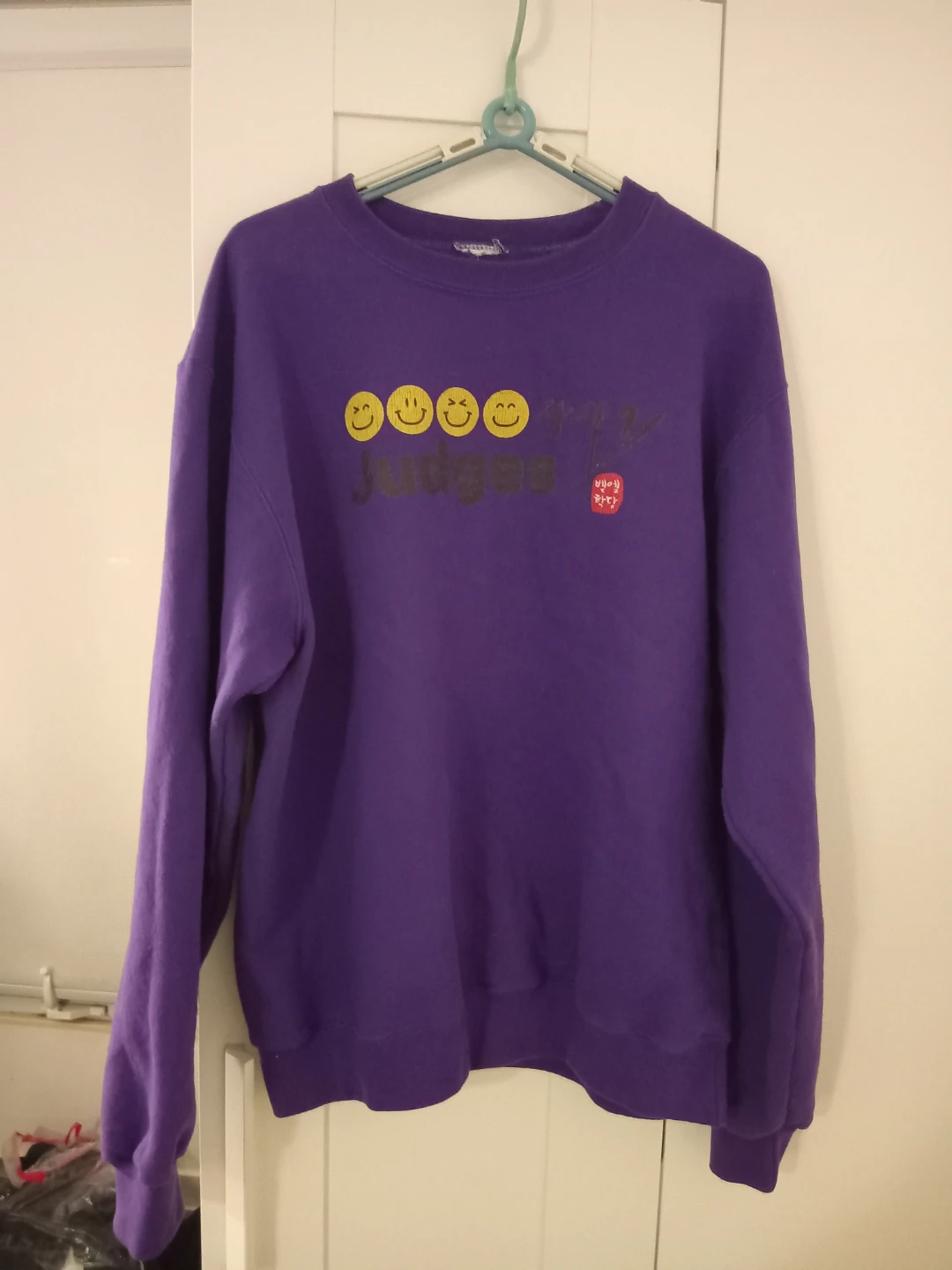 Purple Crewneck Sweatshirt with Smiley Face Graphic