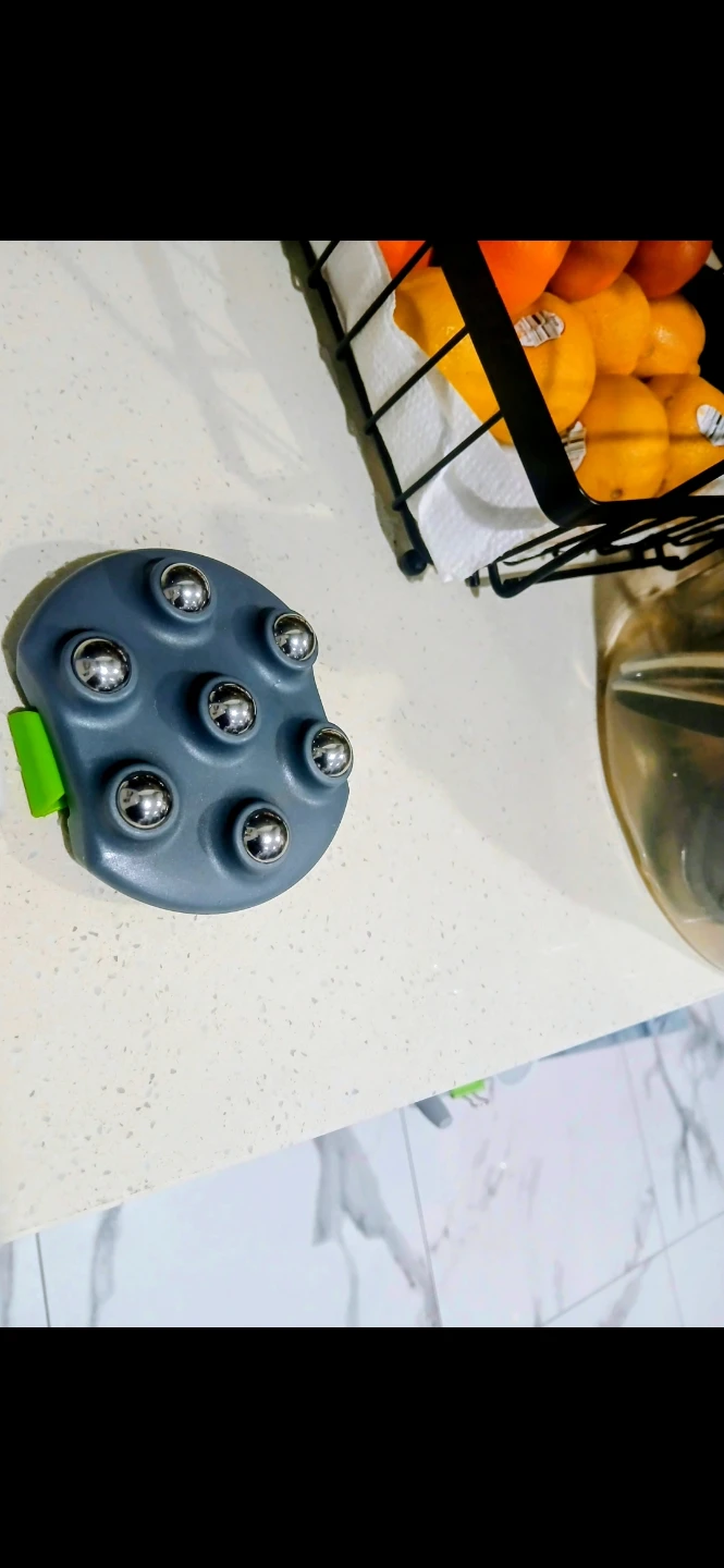 Grey Massager Tool with Rolling Balls