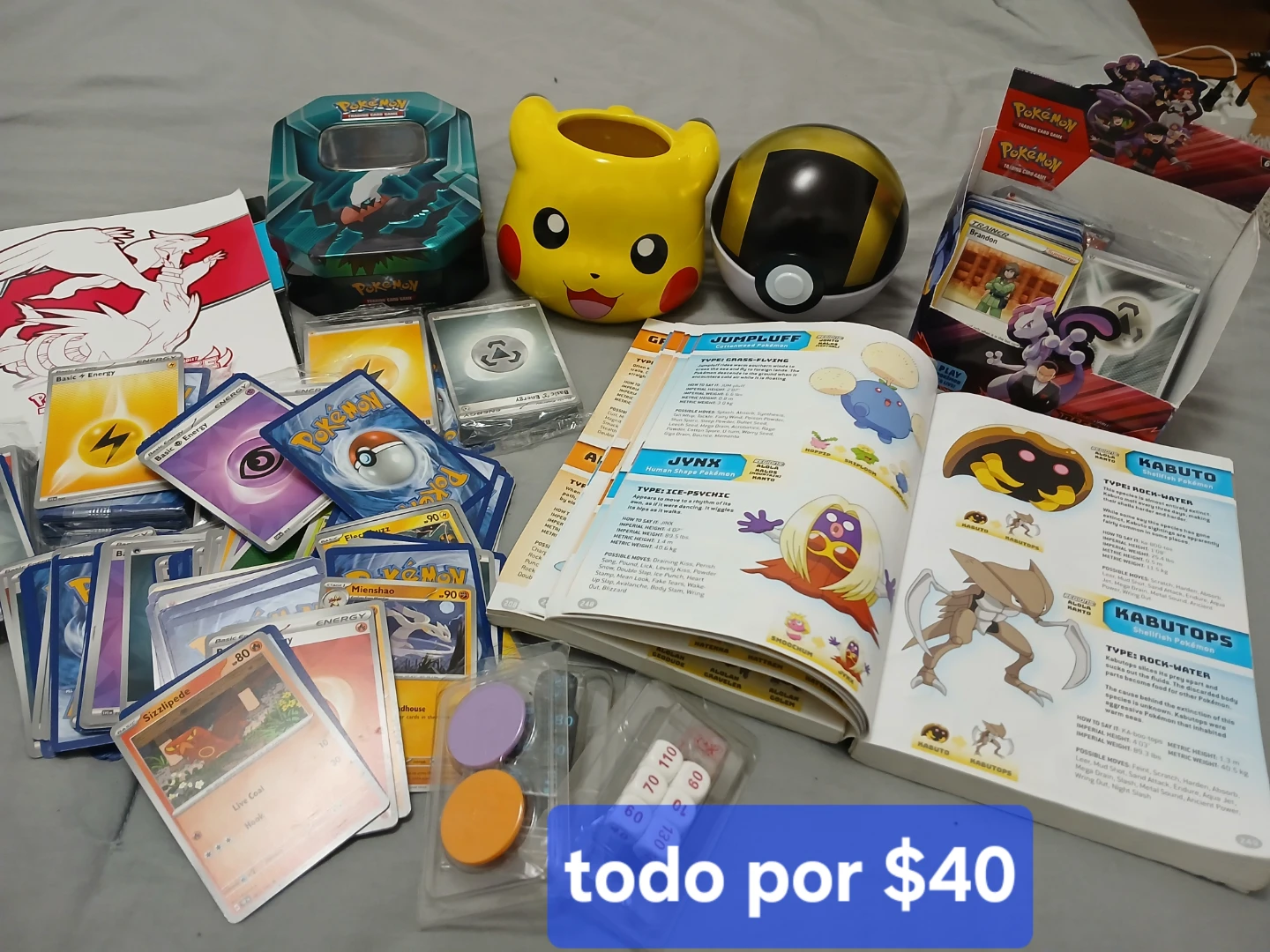 Pokémon Cards, Tin, Pikachu Pot, & Guidebook Bundle