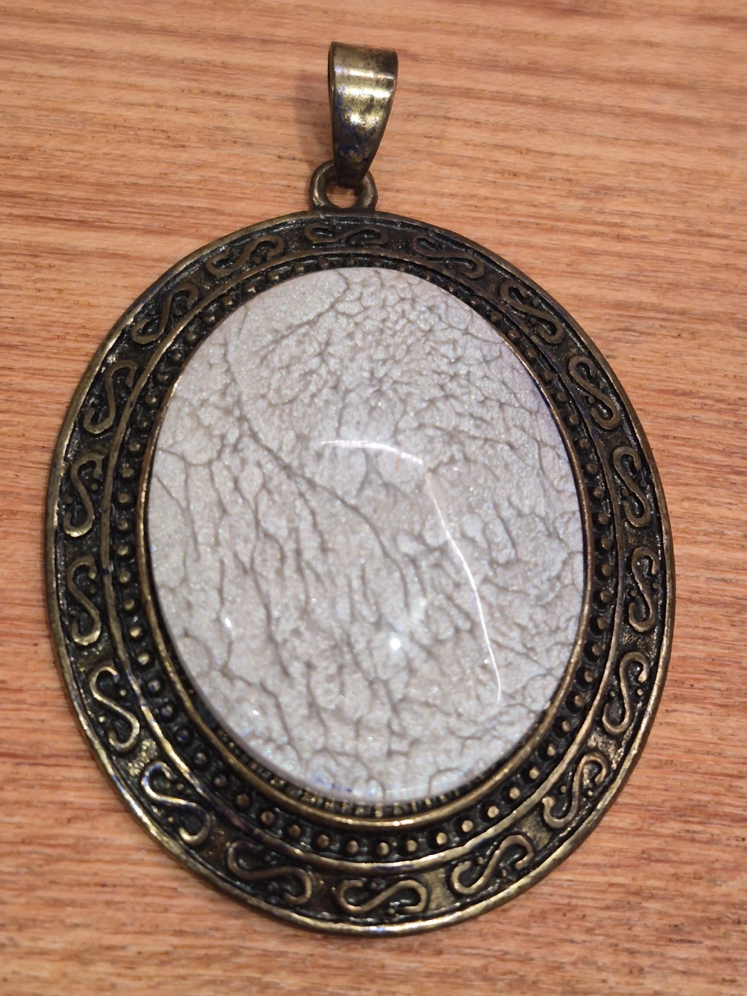 Beautiful 2" Oval Pendant with Crackle-Patterned Stone Set in.. - photo 2