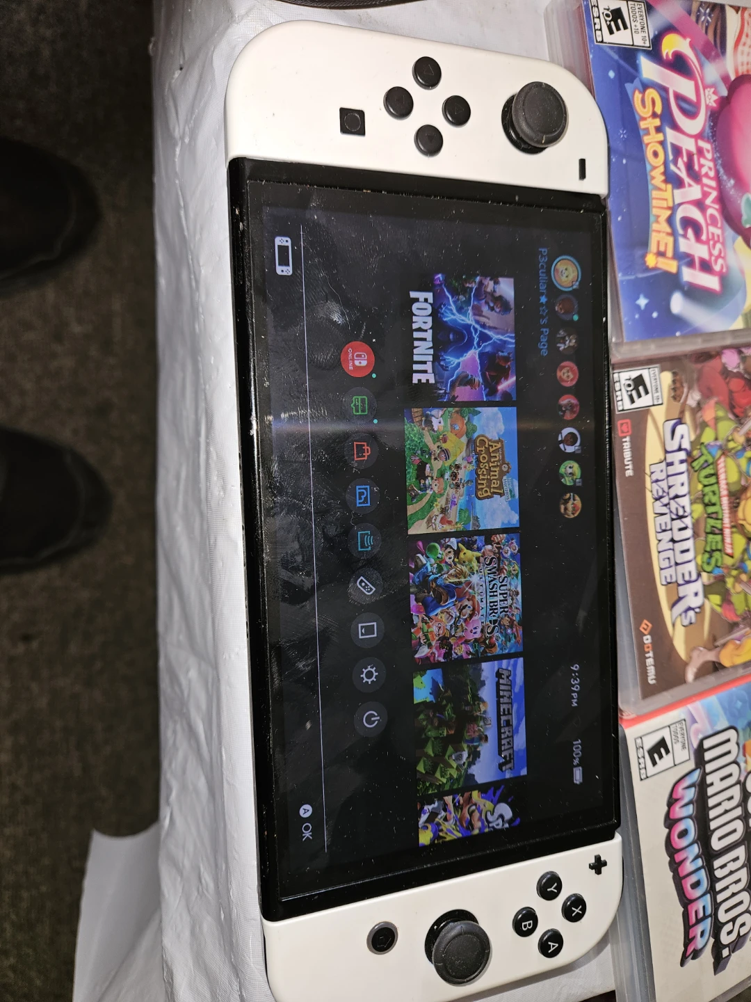 Nintendo Switch OLED + Games & Controllers - photo 2