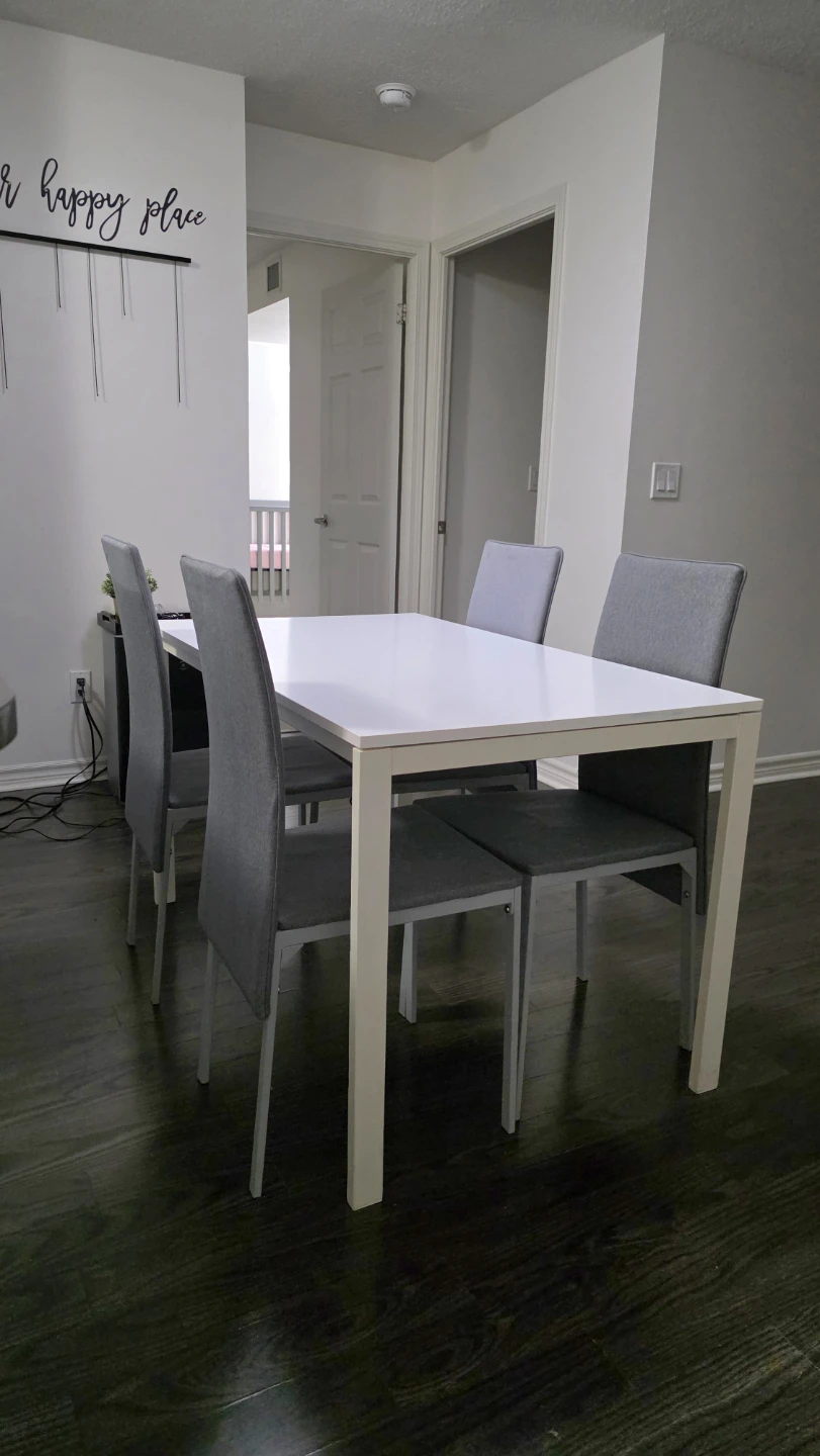 White Dining Table with 4 Grey Chairs