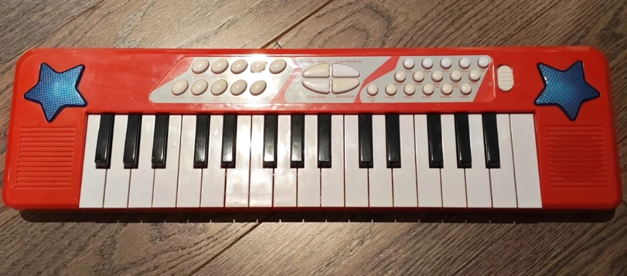 Red Electronic Keyboard Toy, free with other purchase