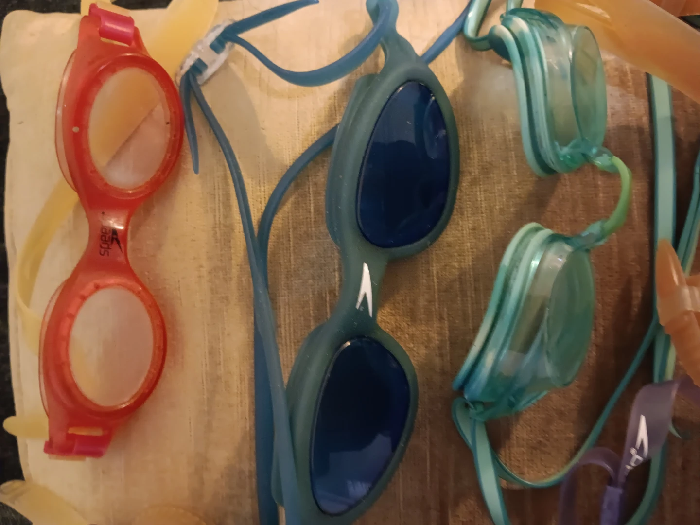 A collection of used swim goggles - photo 2
