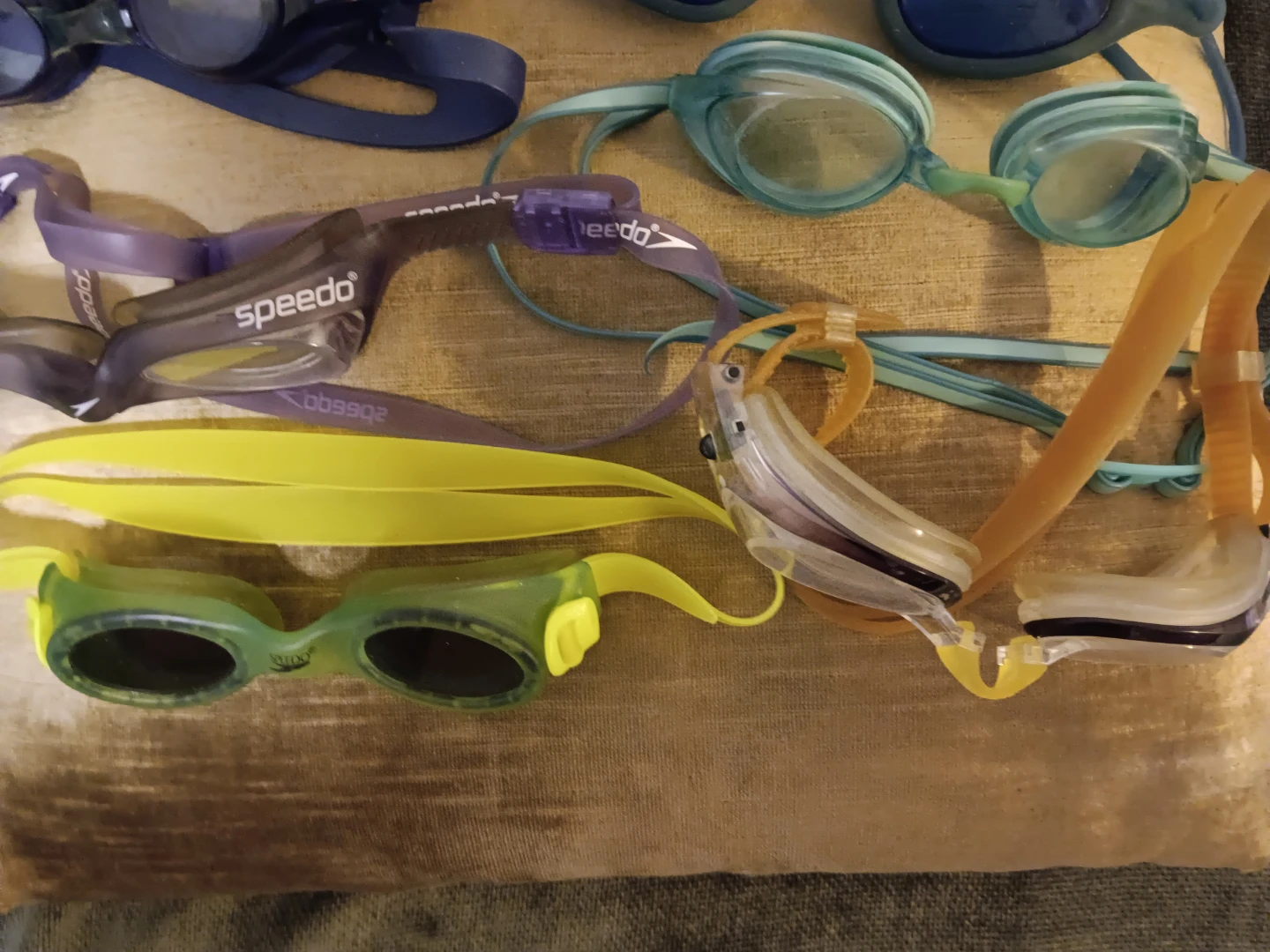 A collection of used swim goggles - photo 3