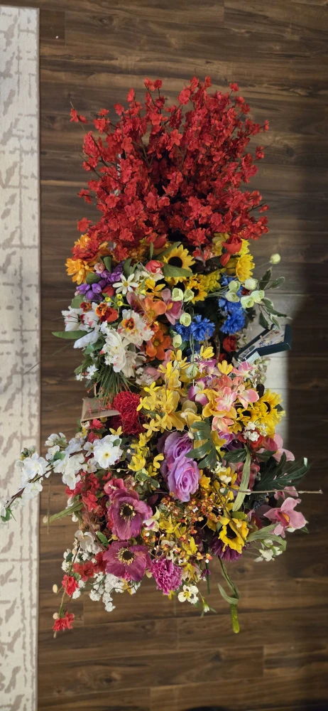 3 boxes of assorted artificial flowers