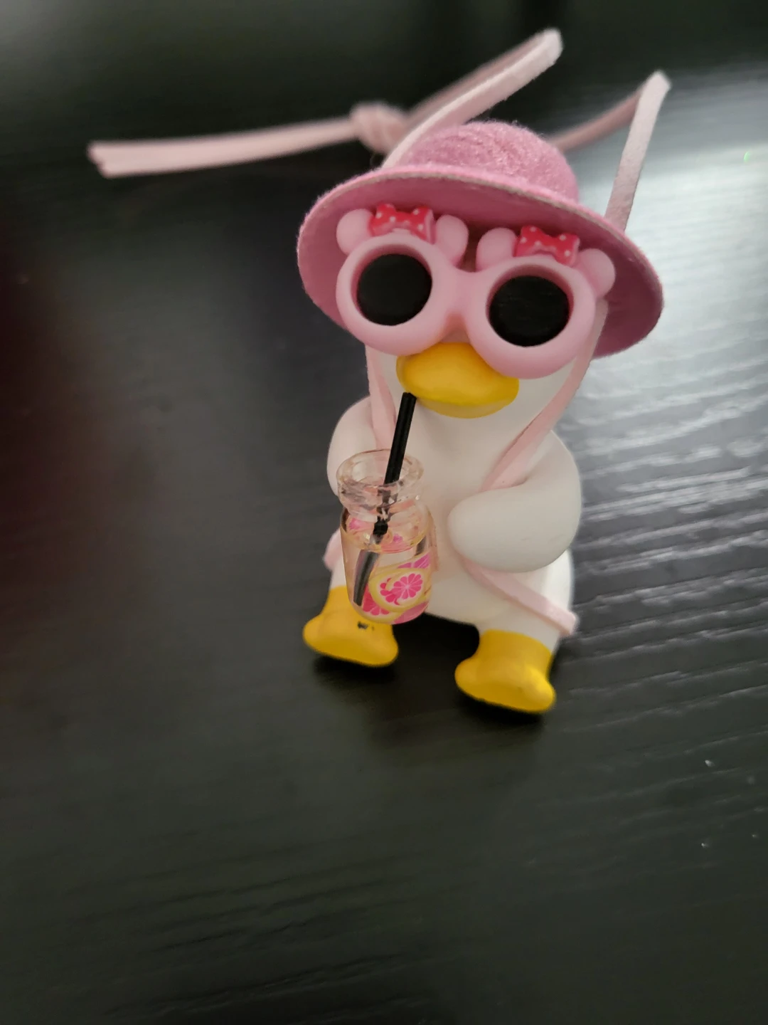 Duck Figurine with Pink Hat and Drink