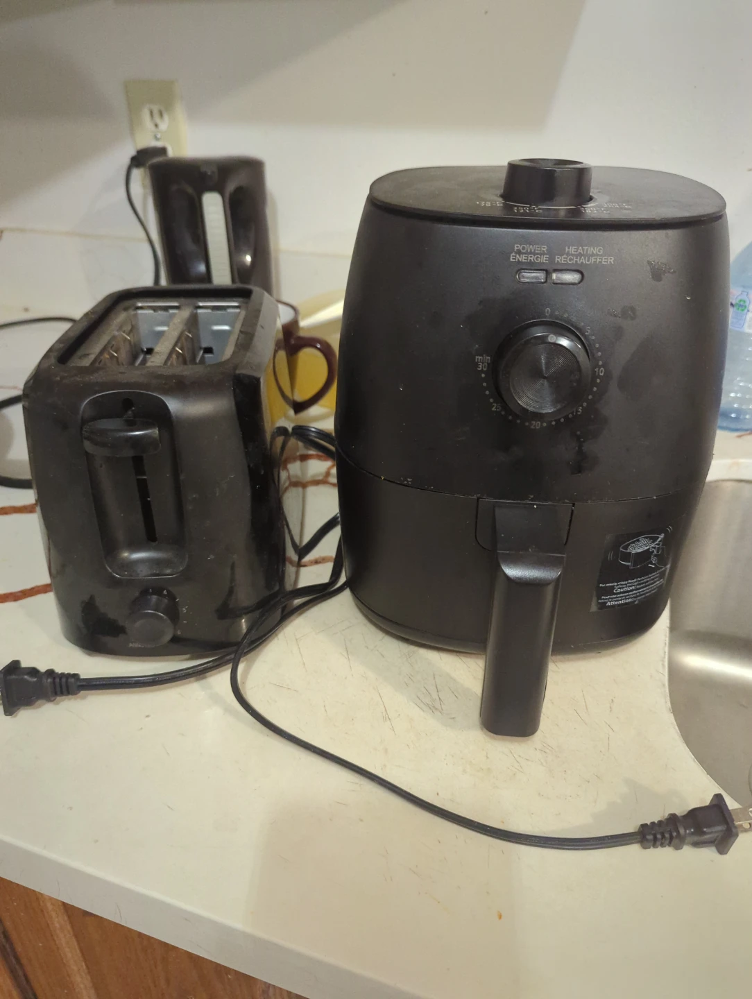 Black Air Fryer and a Toaster
