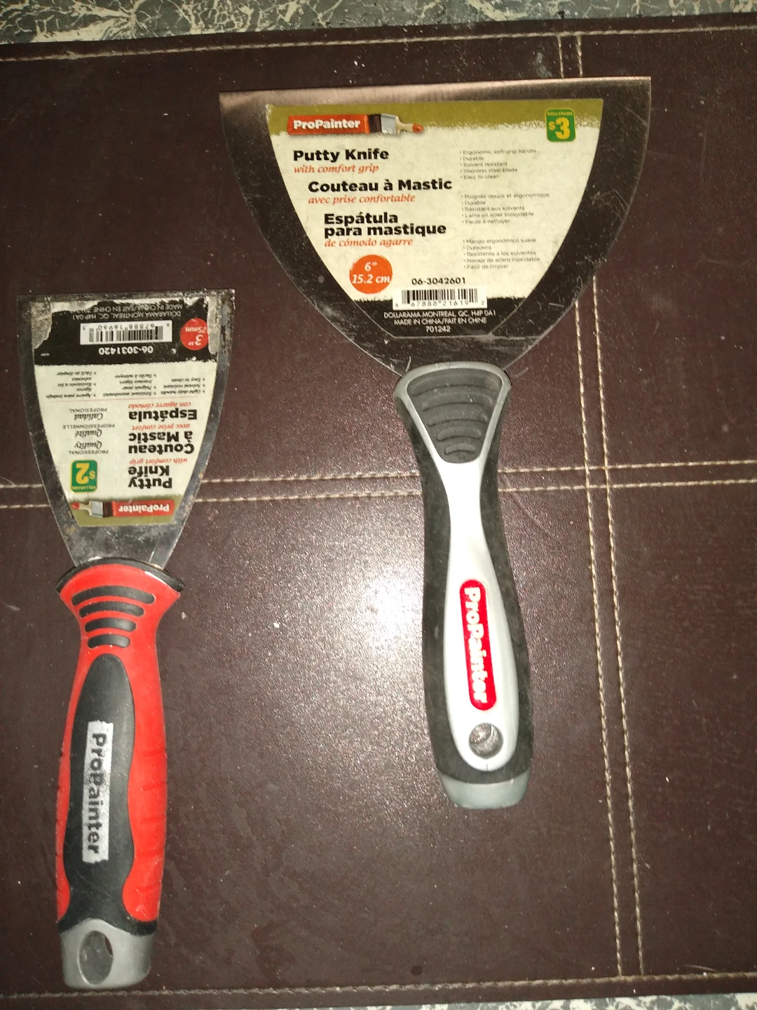 Two brand new putty knife never used