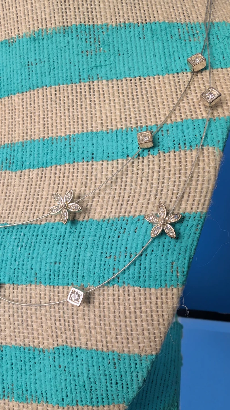Silver-tone necklace with flower and square charms - photo 2