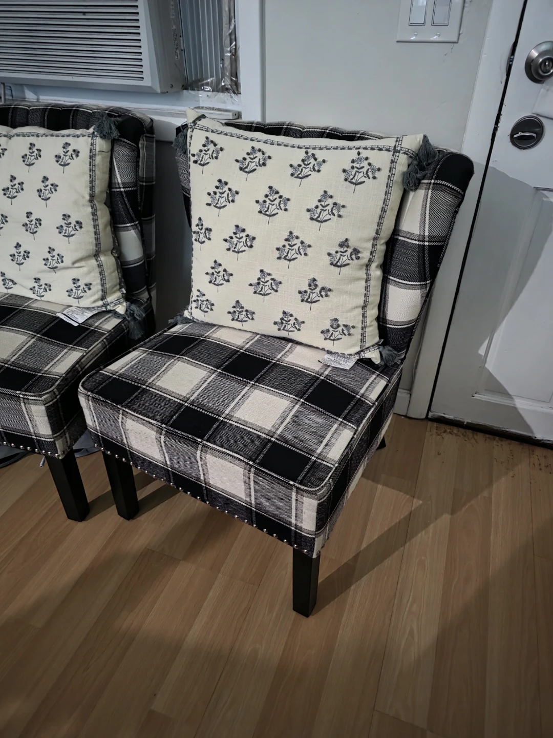 Plaid Accent Chair with Floral Pillow