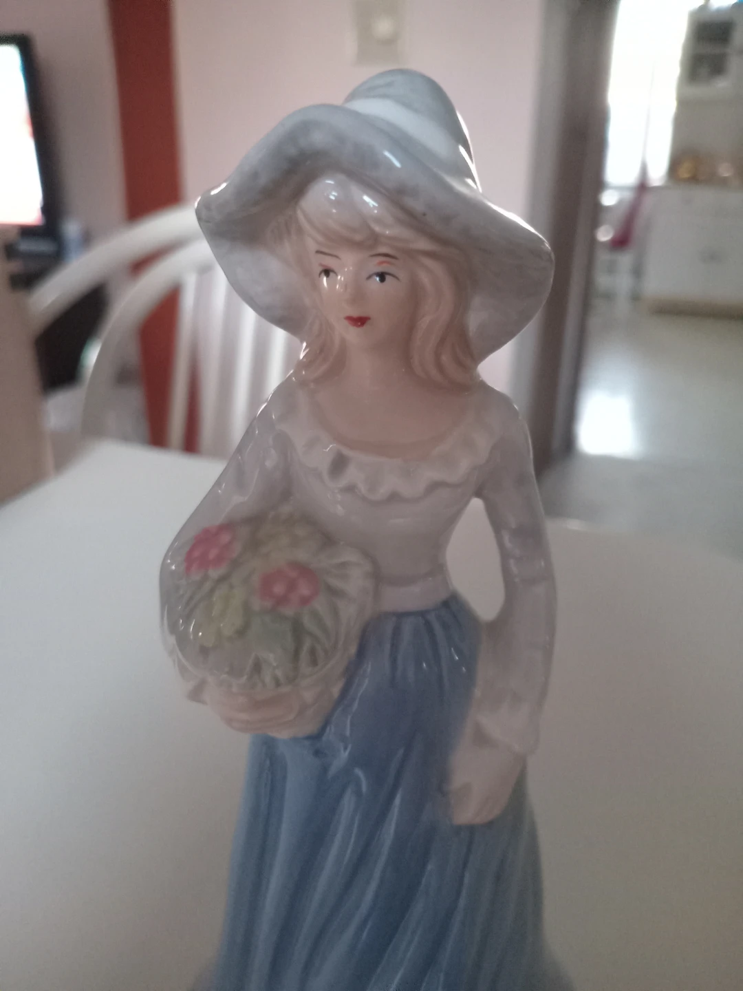 Lady with flower basket