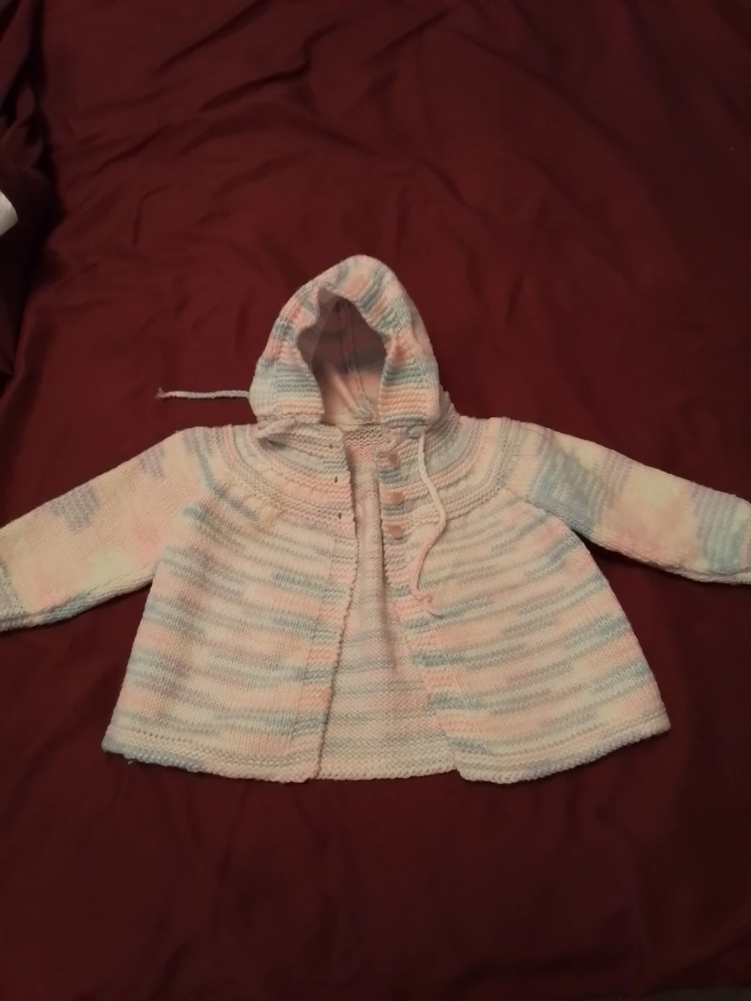 Hand-Knitted Baby Sweater for a girl