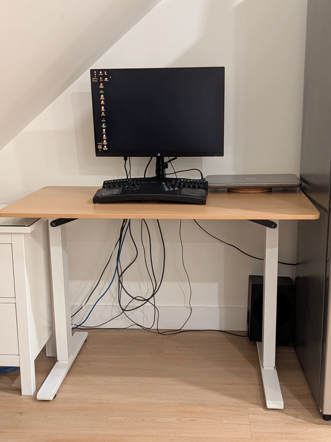 Small Standup Desk with electric motor by MotionGrey