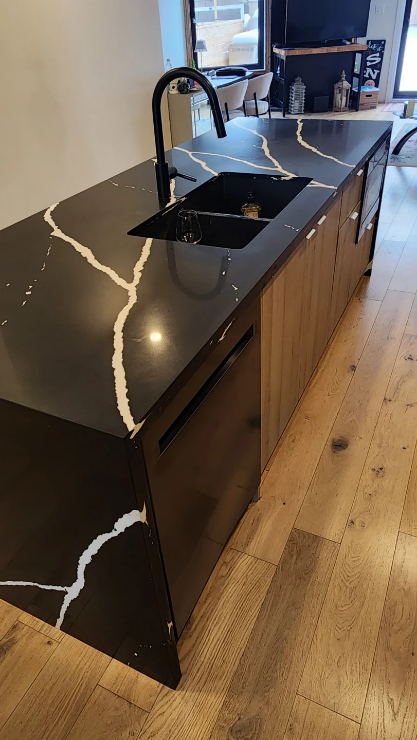 Kitchen Island with sink and faucet.