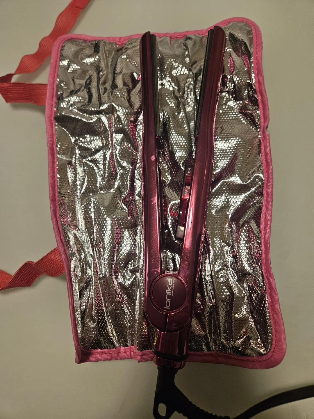 MOVING SALE!- Ionika Hair Straightener with heat resistant pad
