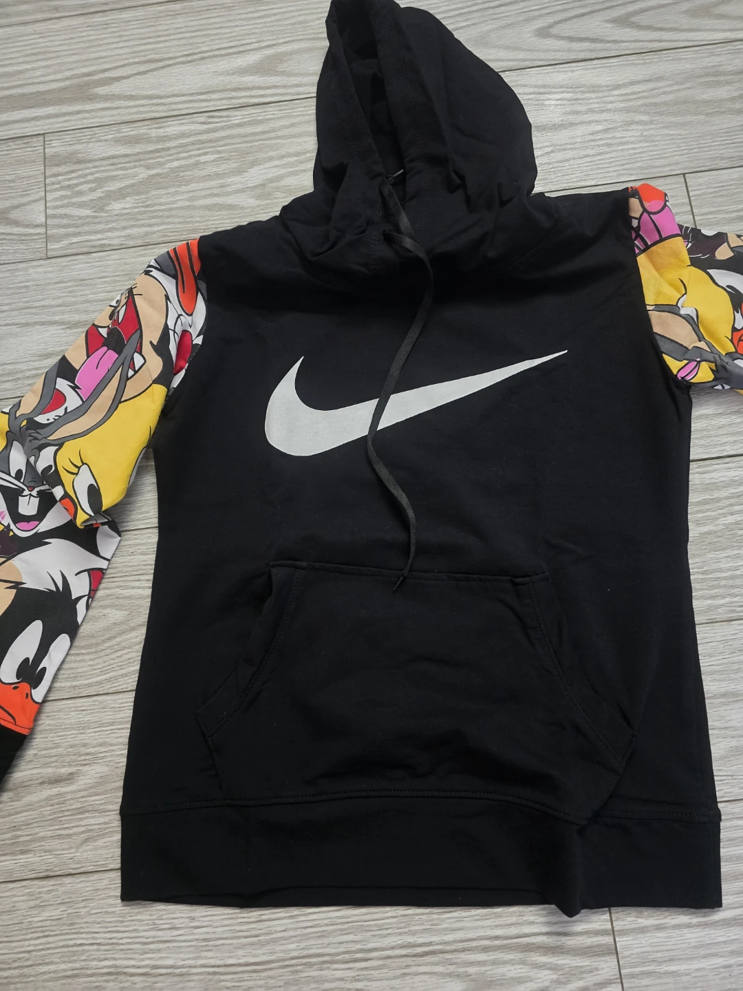 Nike Black Hoodie with Looney Tunes Sleeves - Size L
