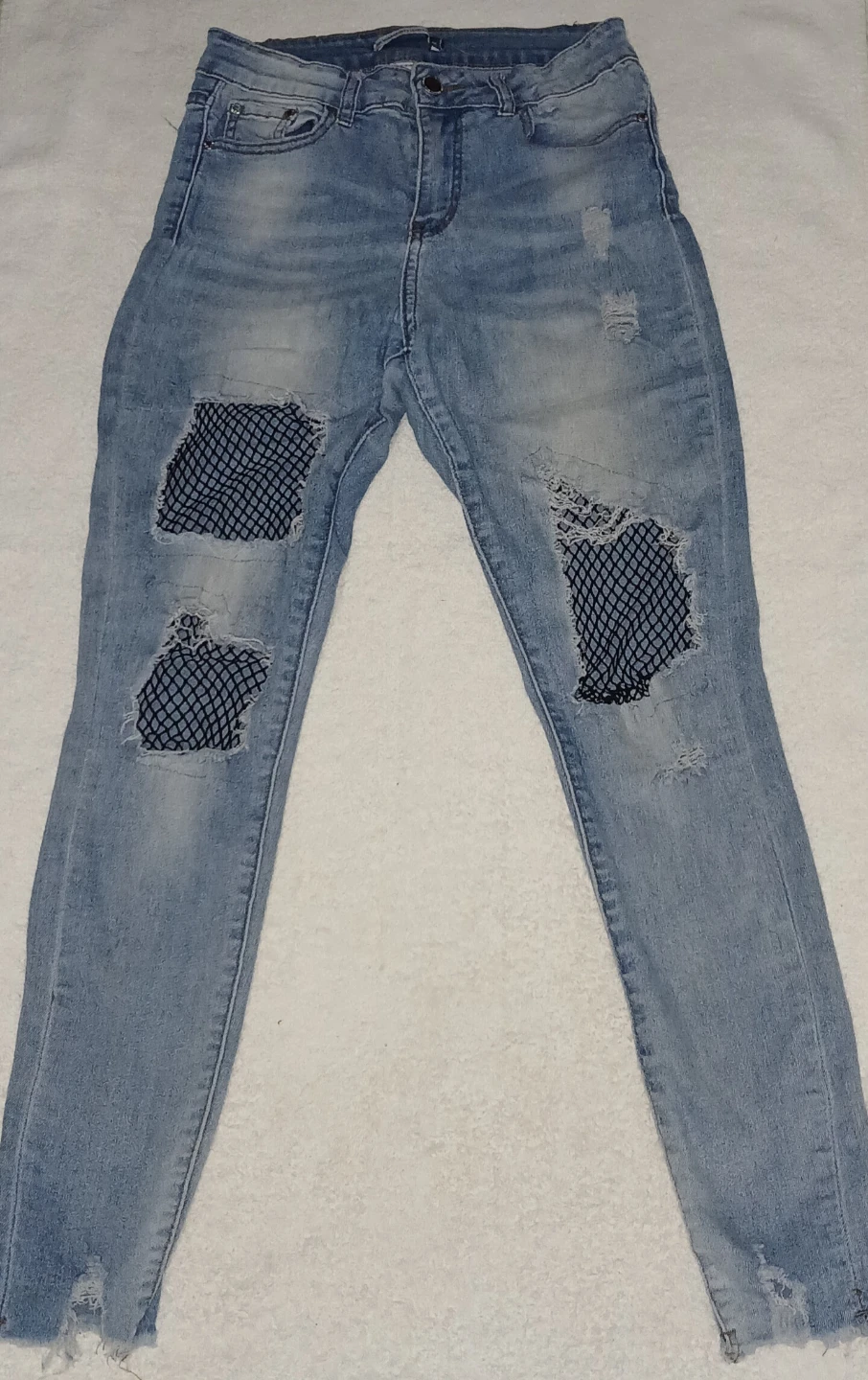 Distressed Light Wash Jeans - photo 3
