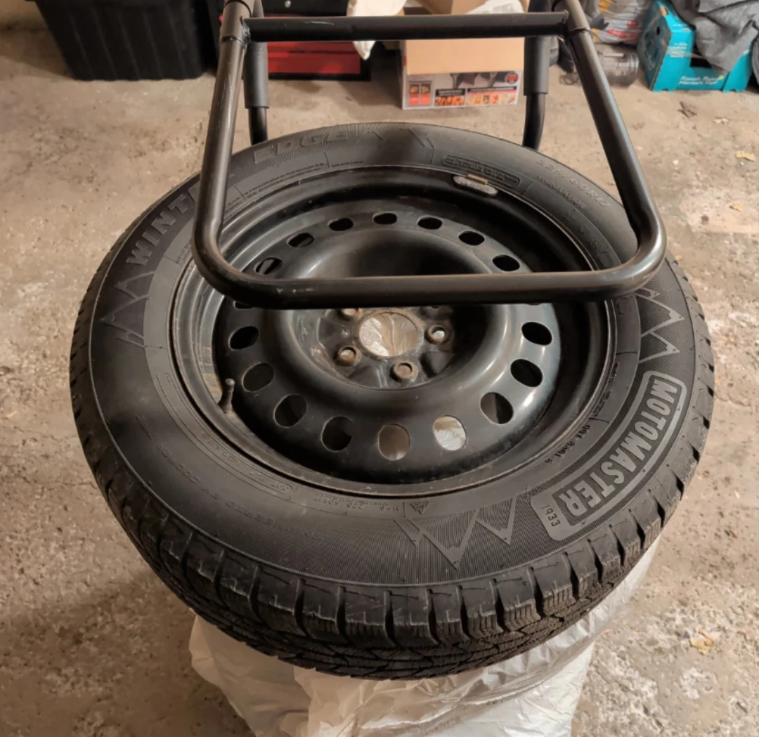 Motomaster Winter Tires on Rims with Tire Dolly