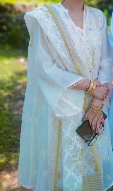 Cream and gold Eid dress