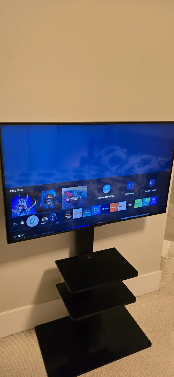 Samsung TV with Black 3-Shelf TV Stand with Mount