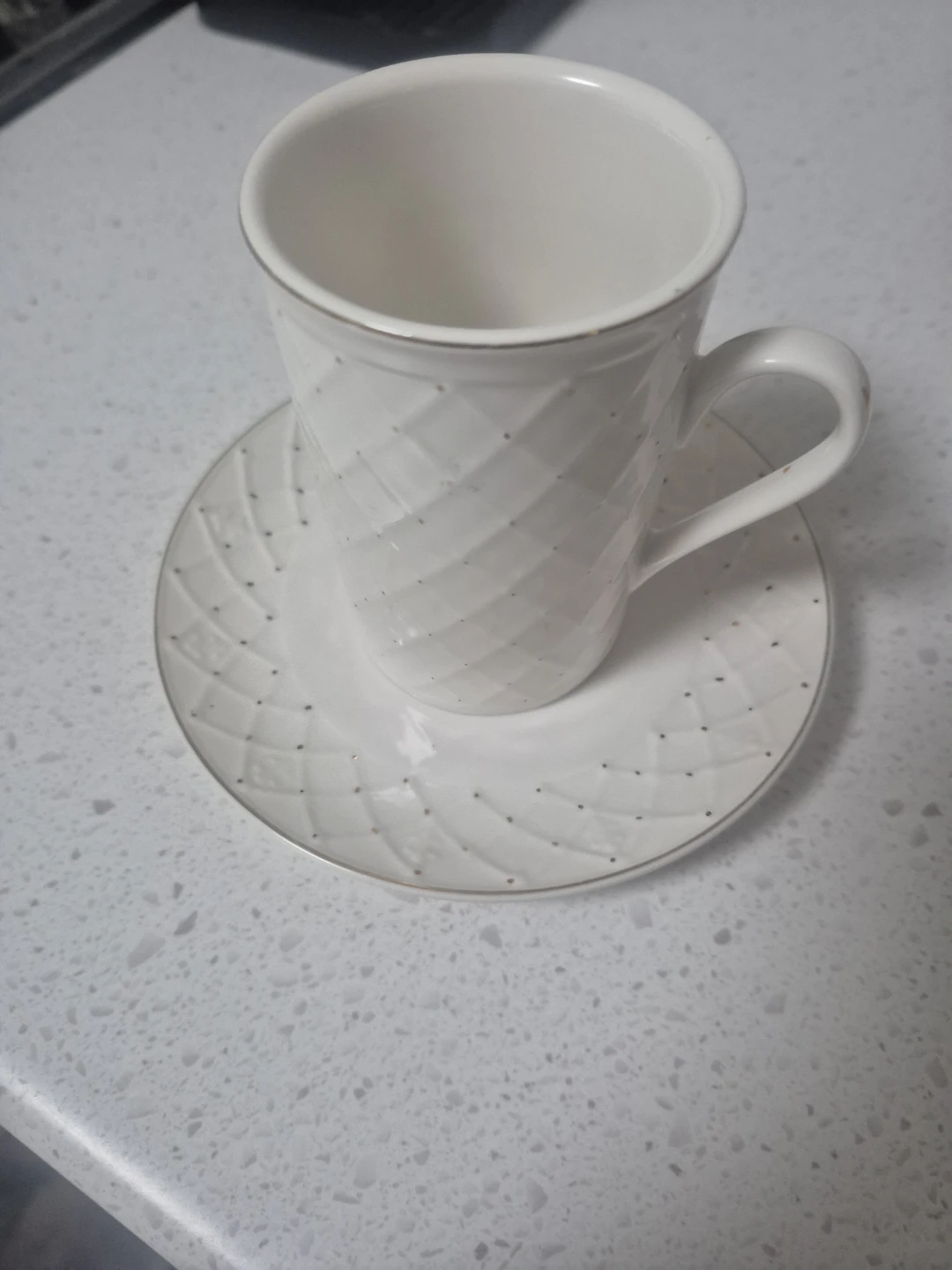 White Cup and Saucer Set