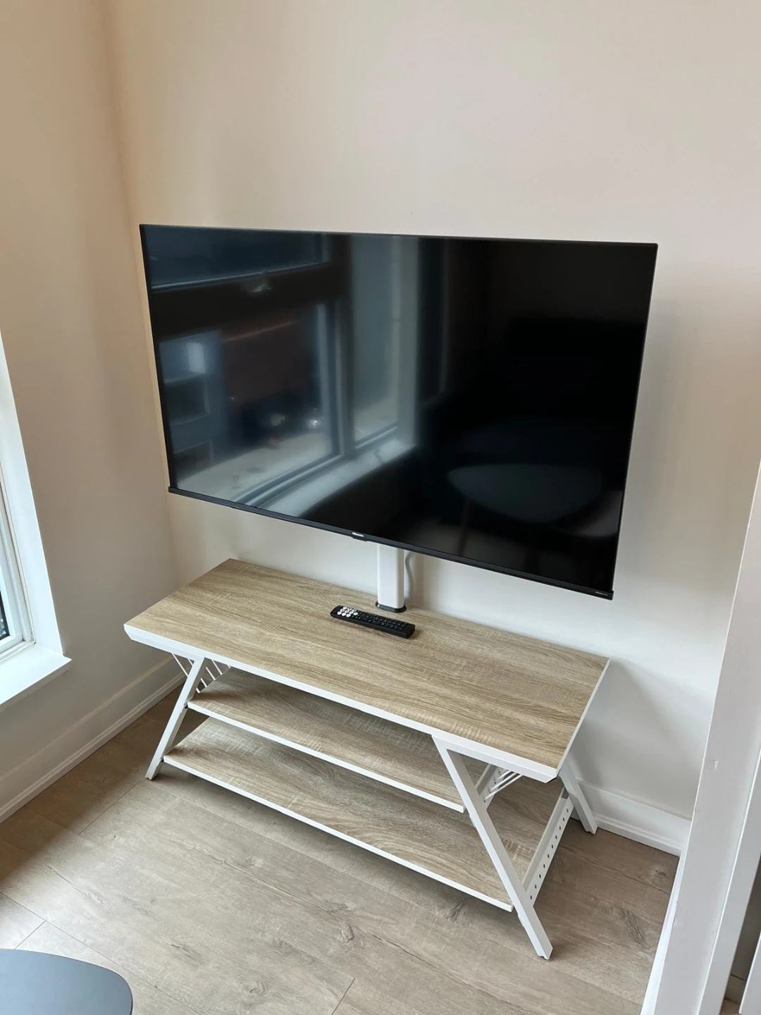 TV Stand with Mount for 32-65" TVs. TV not included.