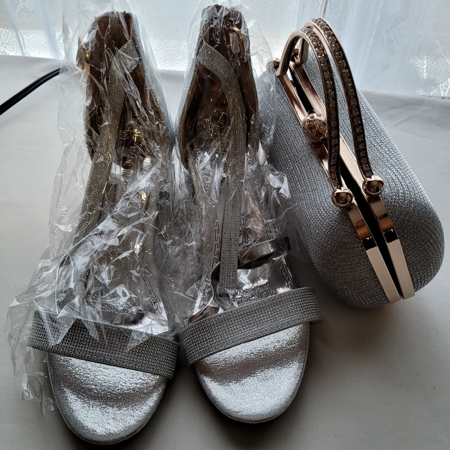 Silver Heeled Sandals size 39  and Clutch Bag Set still new .