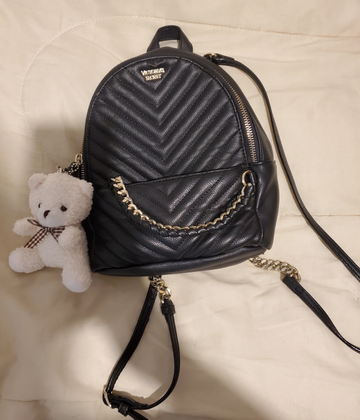 Victorias Secret black mini backpack with gold-like chain accent