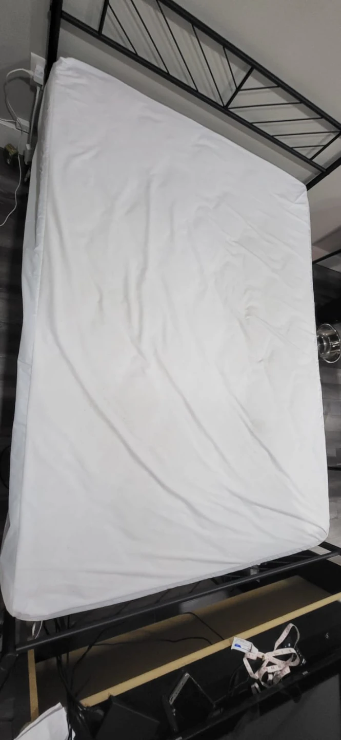 Mattress with Breathable Fabric Cover and bedframe