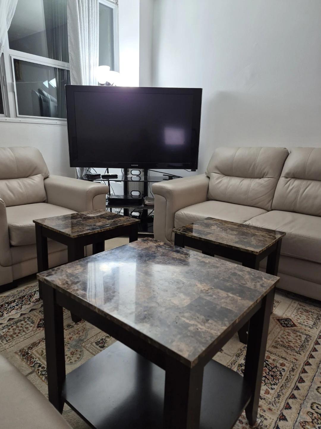 Beige sofas, TV with stand, Dining Table, Coffee tables for sale