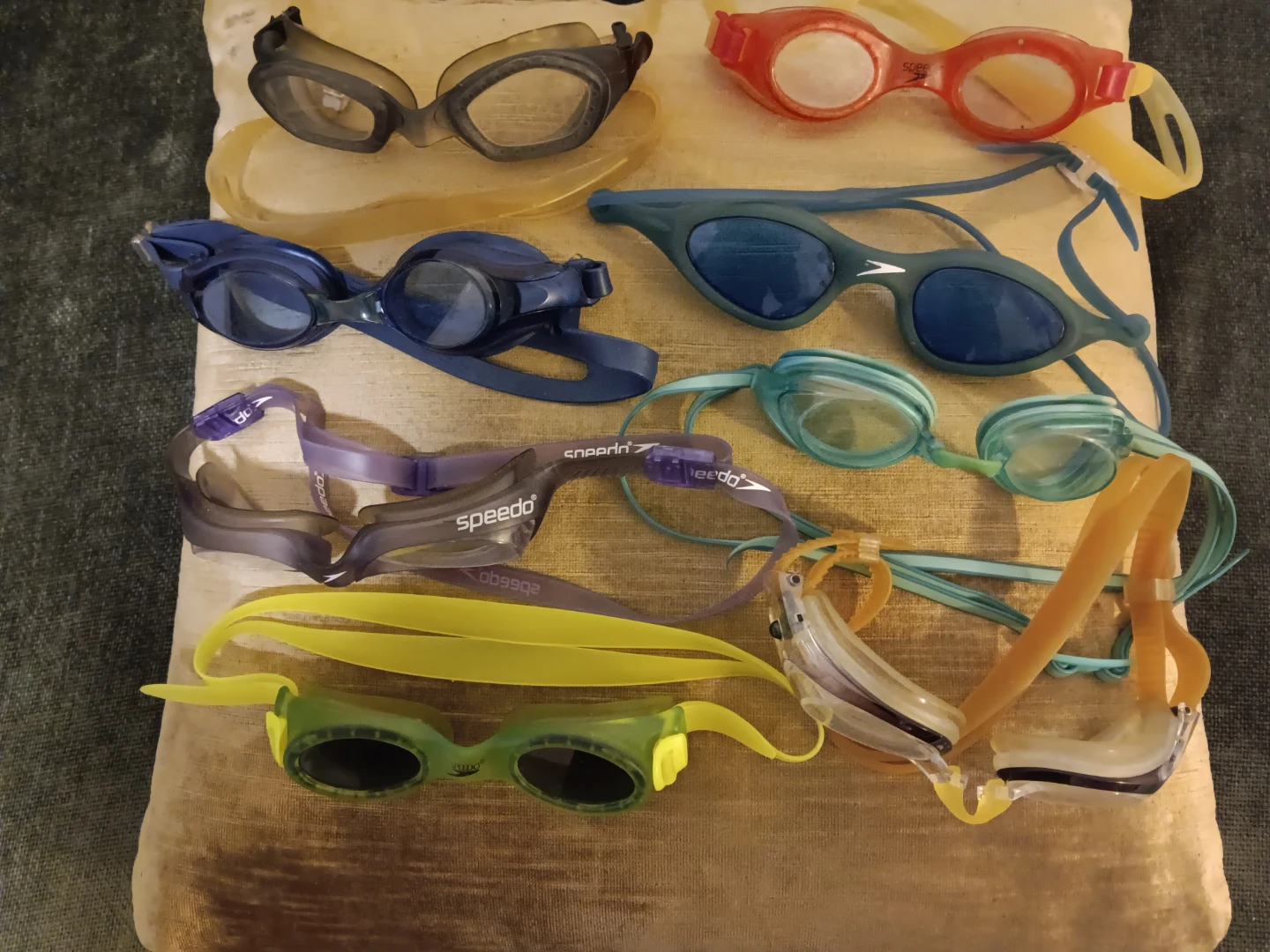 A collection of used swim goggles