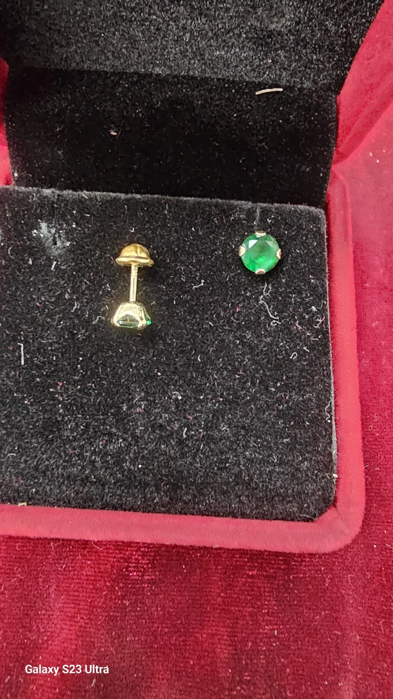 One  pairs 14-karat gold earrings with cubic zirconia stone