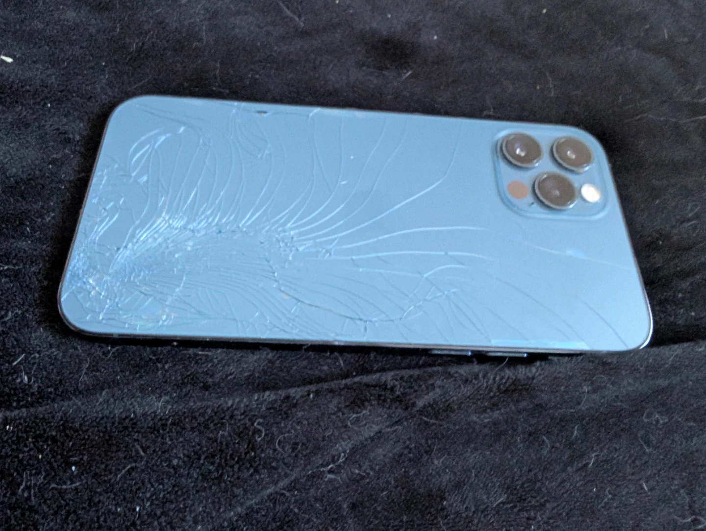 Blue iPhone 12 Pro with cracked back glass - photo 3