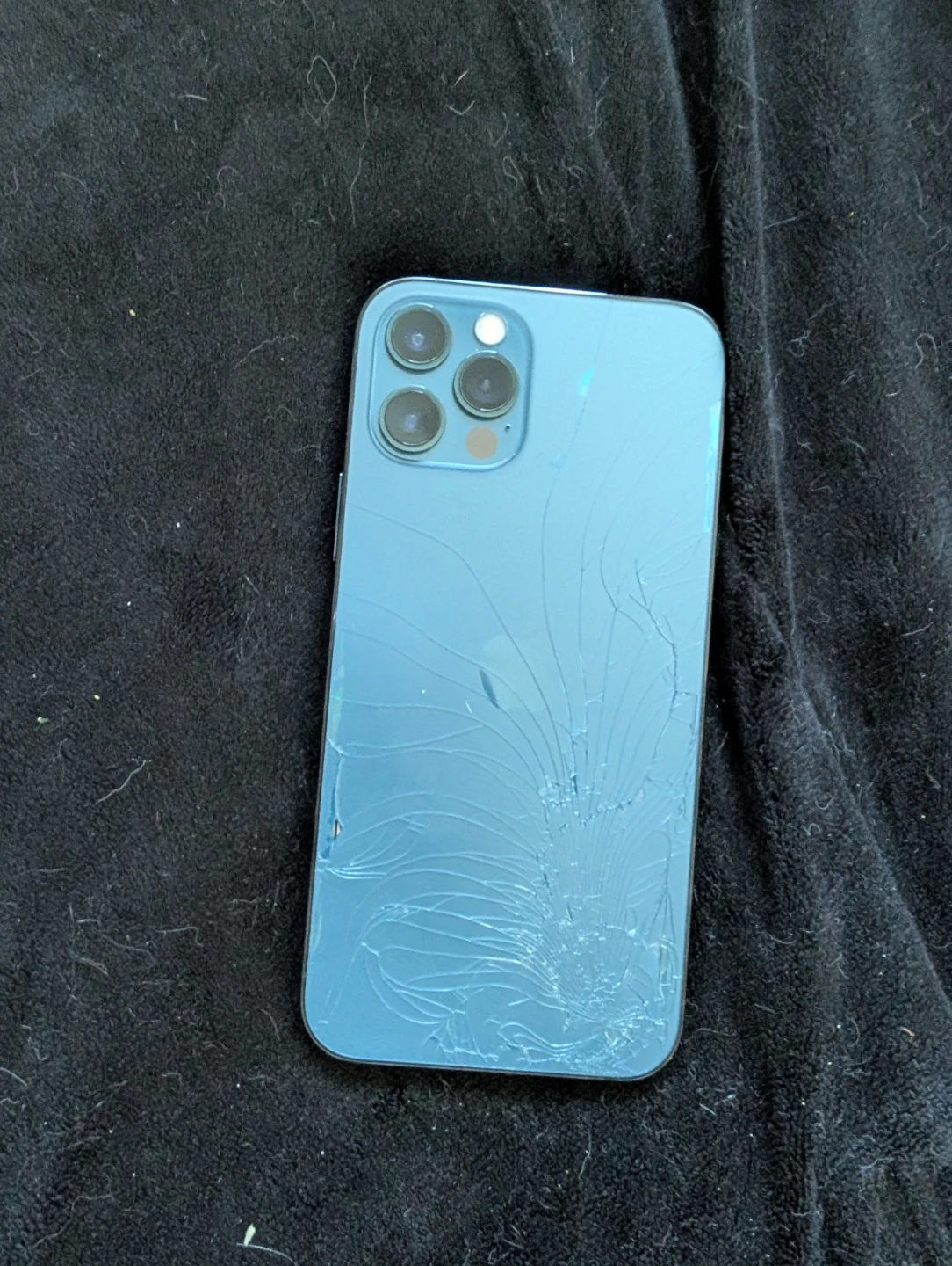 Blue iPhone 12 Pro with cracked back glass - photo 4