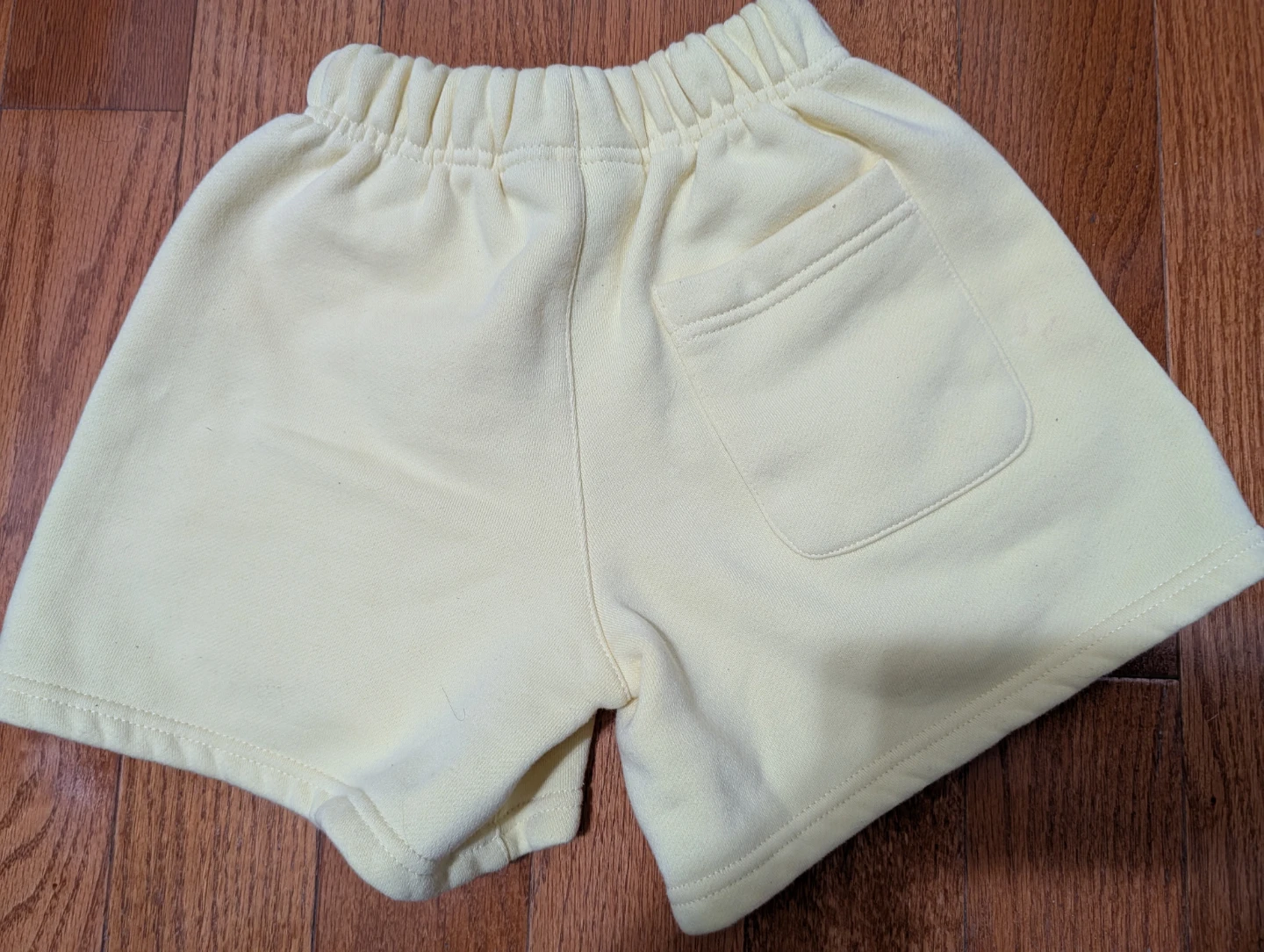 Essentials Fear of God Kids Sweat Shorts - Yellow - photo 5