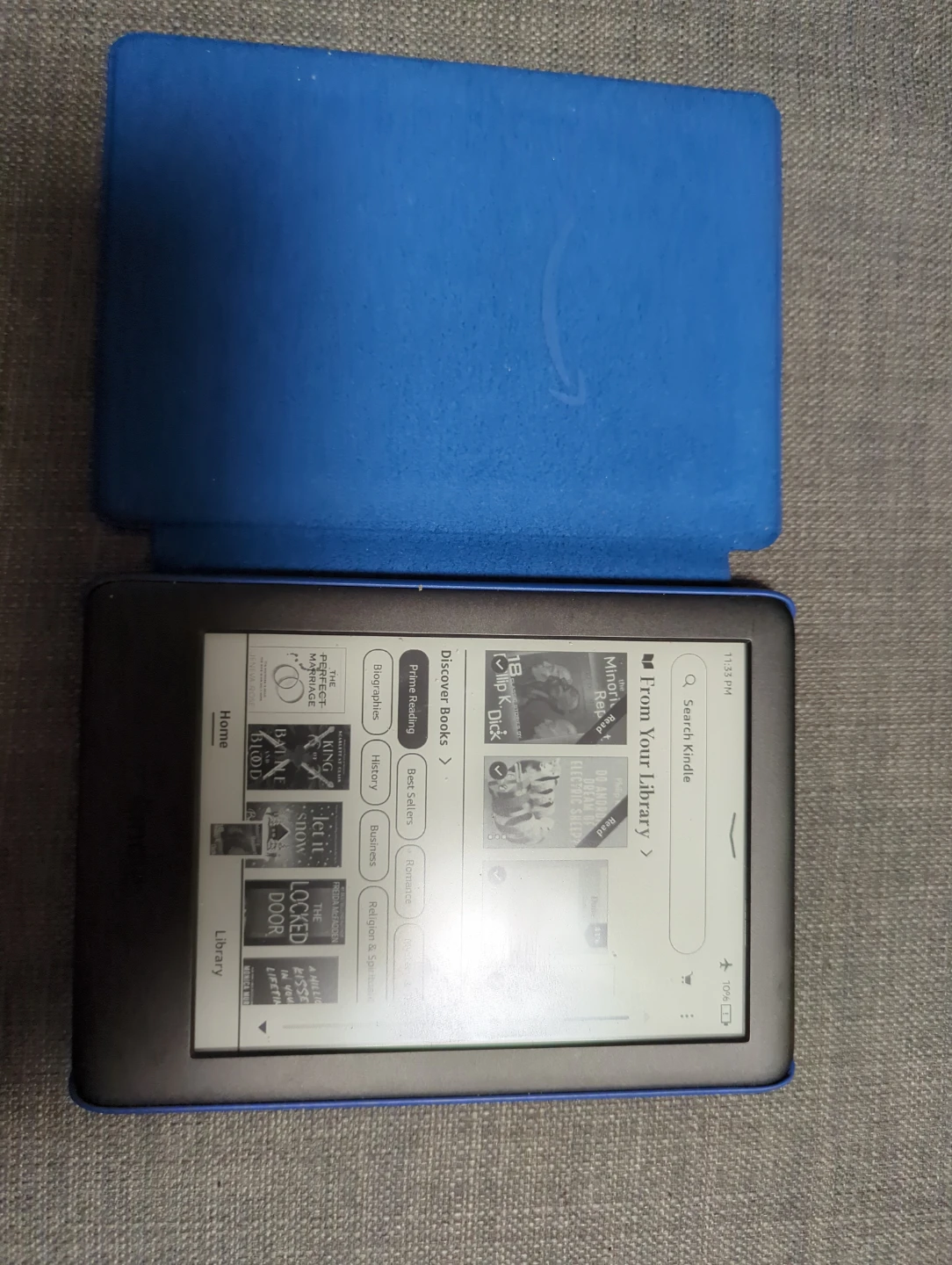 Amazon Kindle with Blue Fabric Cover
