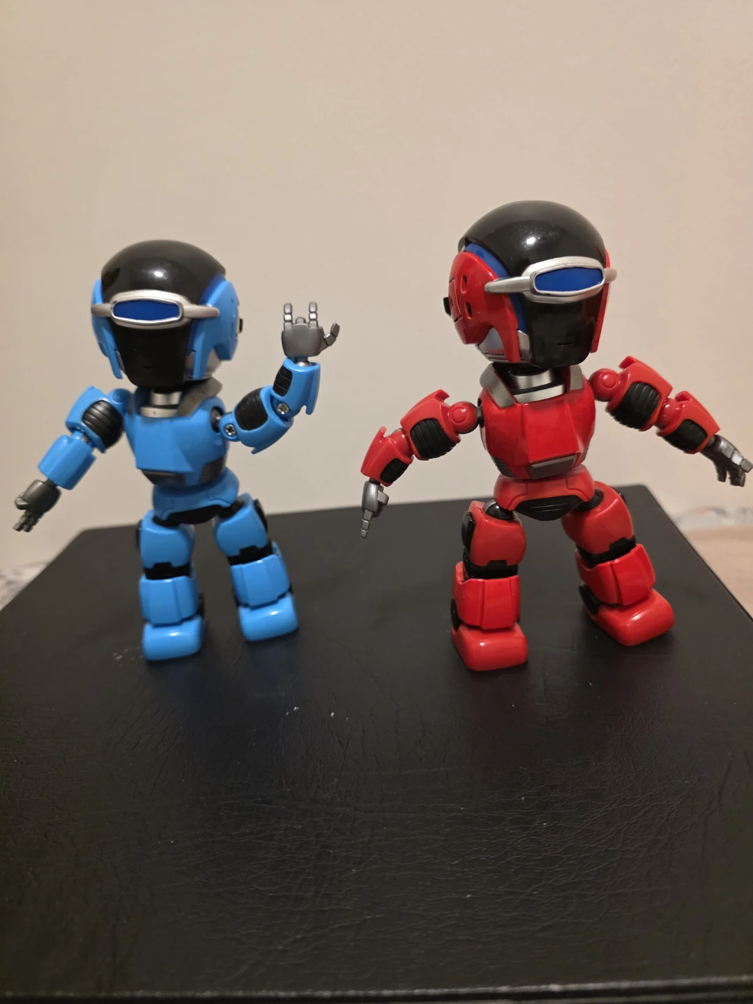 Two Robot Action Figures - Red and Blue