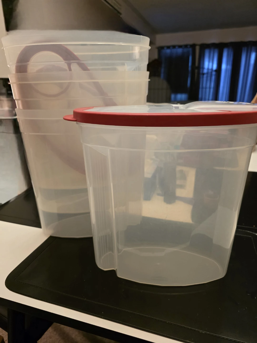 4 Rubbermaid storage containers